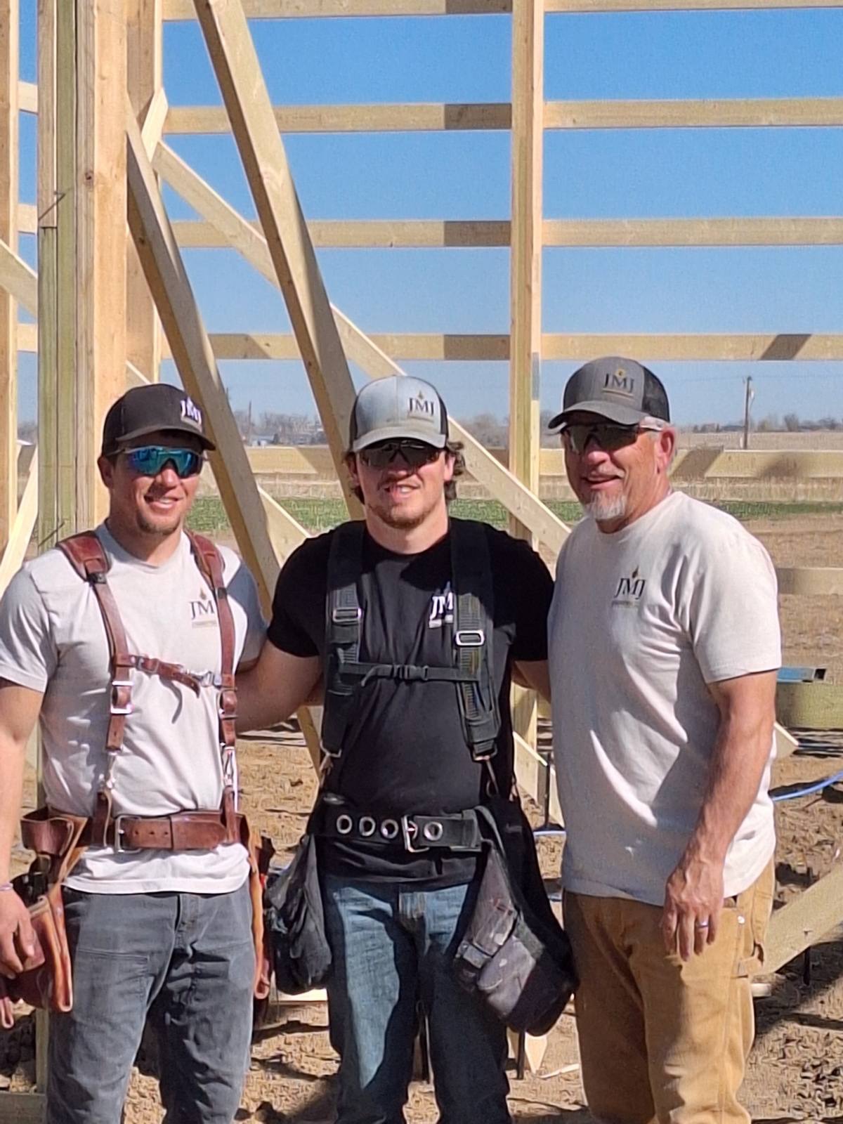 JMJ Construction team — Luke and Chad Baumann with crew